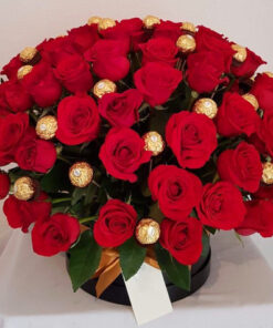 Roses and chocolates in basket, flower delivery in muscat
